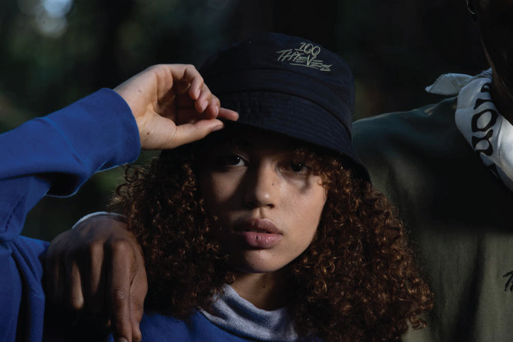 Model in FW'22 Bucket Hat.