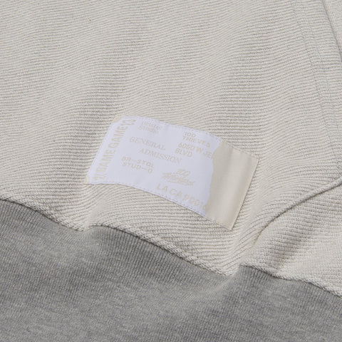 Pocket detail on 100T X Bristol Studio Reversible Hoodie - Oatmeal Heather