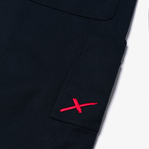 X logo detail on pocket of Carpenter Pant