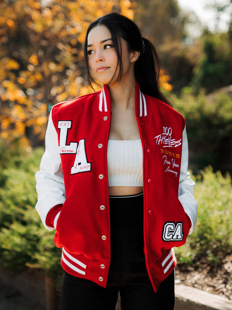 Valkyrae in 100 Thieves Gold Bear Varsity Jacket