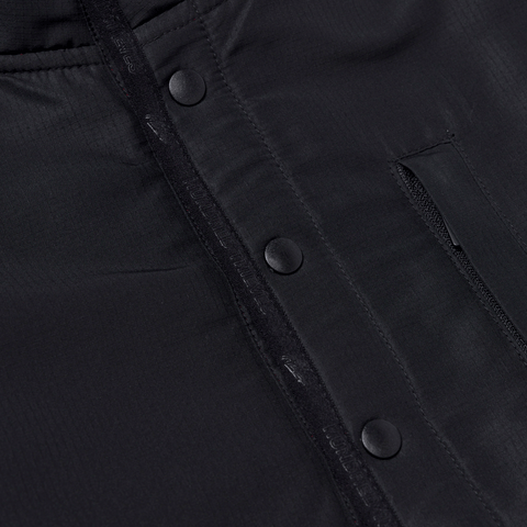 Button detail on Foundations FW'24 Polar Fleece Pullover - Red