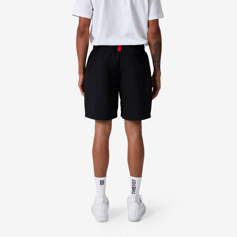 back of 100 Thieves Foundations nylon short with extra wide elastic waistband and 100 Thieves metal aglet tipped drawstrings in color black.