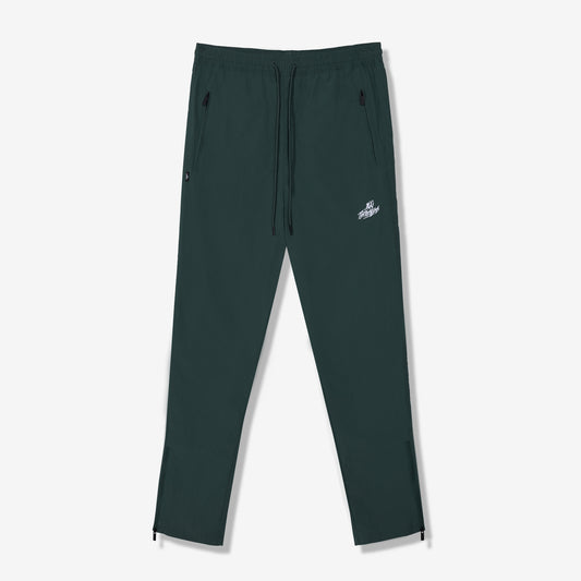 100 Thieves Foundation nylon pants with elastic waistband and 100 Thieves metal aglet tipped drawstrings in the color alpine