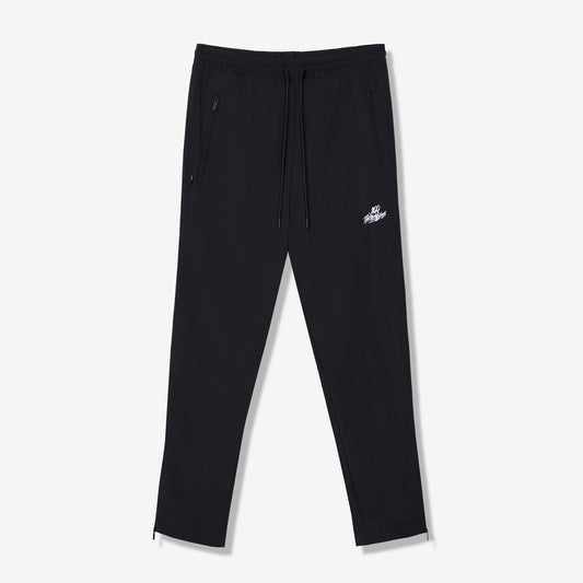 100 Thieves Foundation nylon pants with elastic waistband and 100 Thieves metal aglet tipped drawstrings in the color black